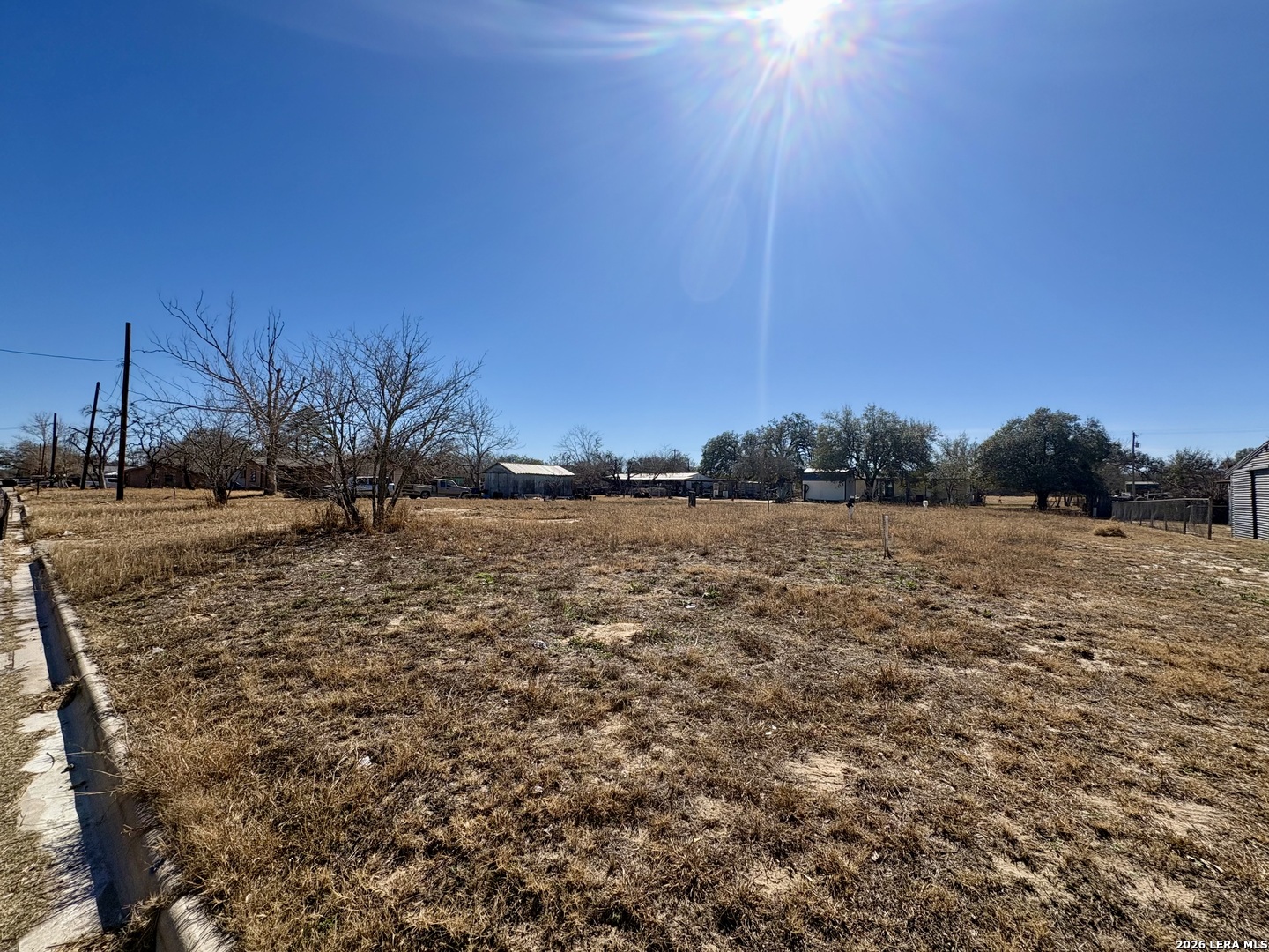 0 Trade Street Pleasanton, TX 78064 - Photo 4 of 6 a view of a yard with an outdoor space