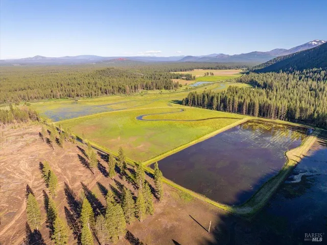 a view of an ocean and city