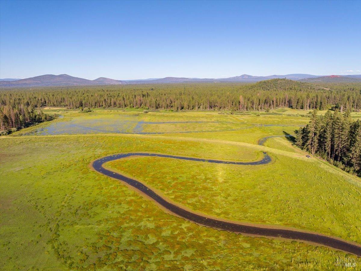 Undisclosed Address Burney, CA 96013 - Photo 31 of 39 a view of an ocean and a mountain