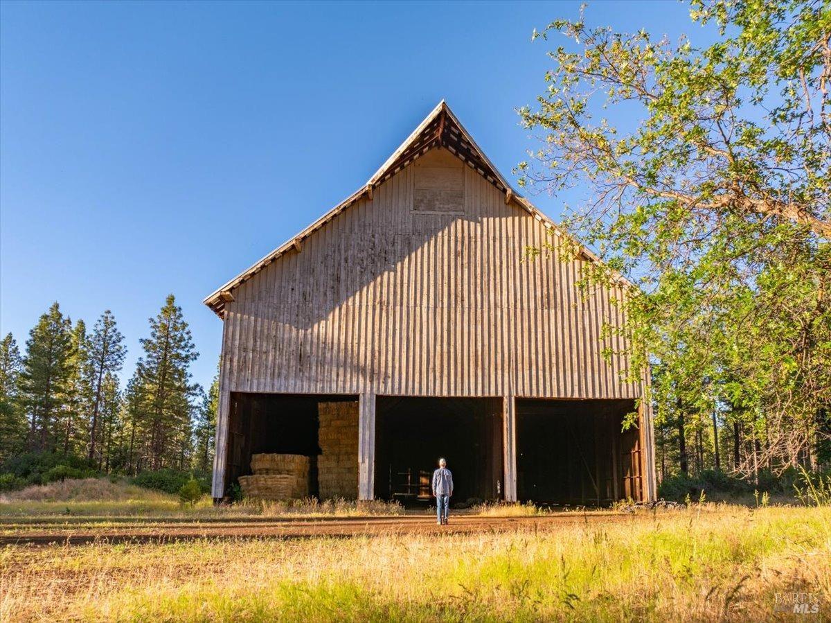 Undisclosed Address Burney, CA 96013 - Photo 35 of 39 a view of house with yard and swimming pool