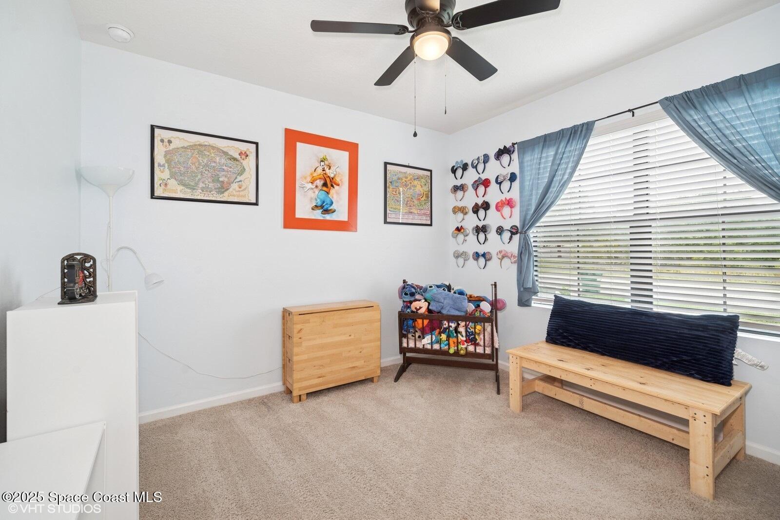 5221 Talbot Boulevard Cocoa, FL 32926 - Photo 24 of 32 a bedroom with furniture and a window