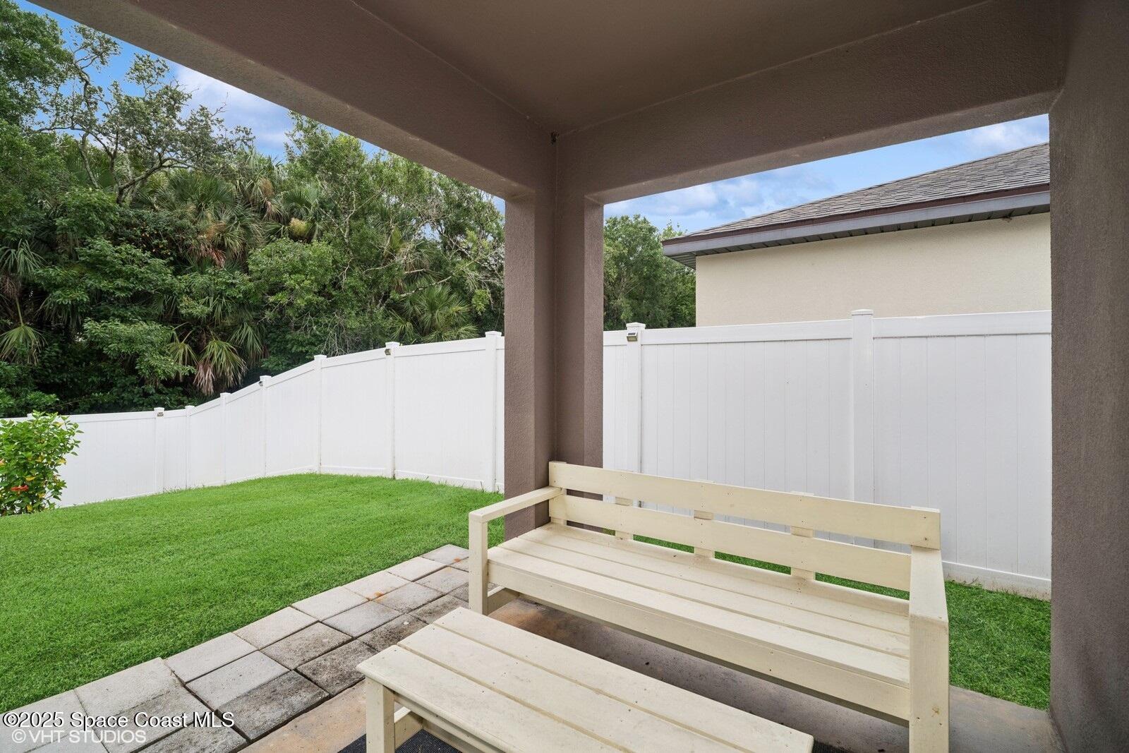 5221 Talbot Boulevard Cocoa, FL 32926 - Photo 27 of 32 a view of backyard with large trees