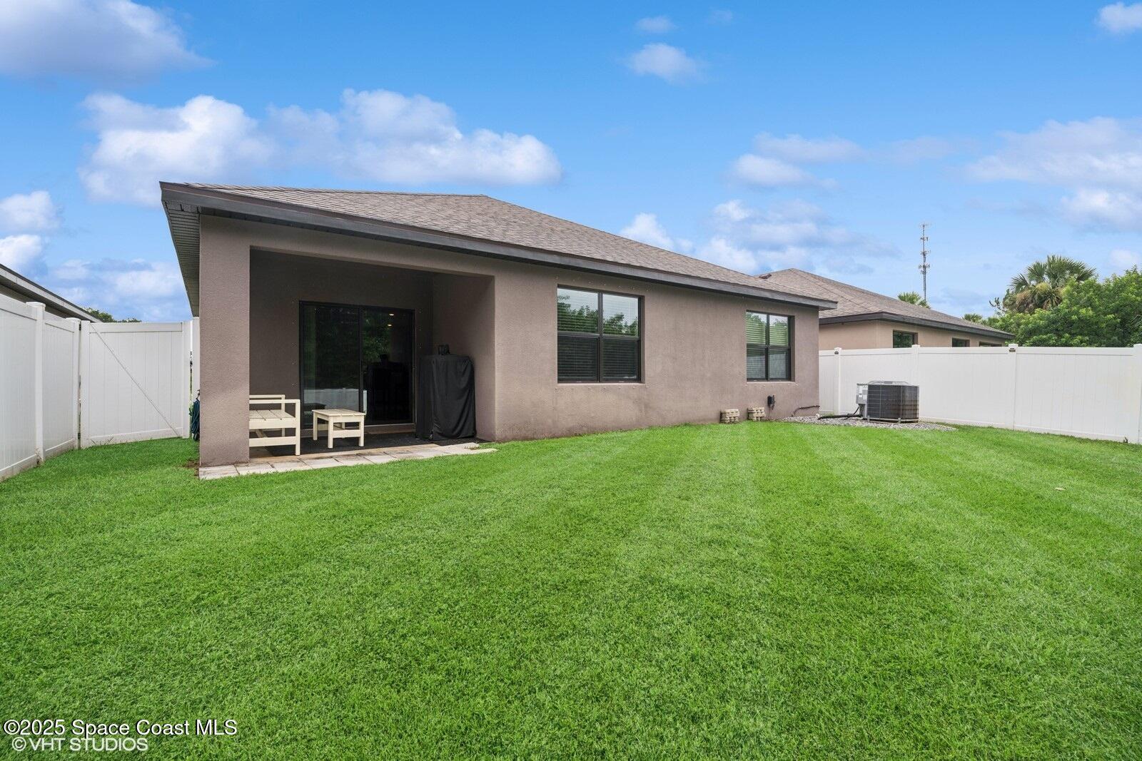 5221 Talbot Boulevard Cocoa, FL 32926 - Photo 28 of 32 a house view with a garden space