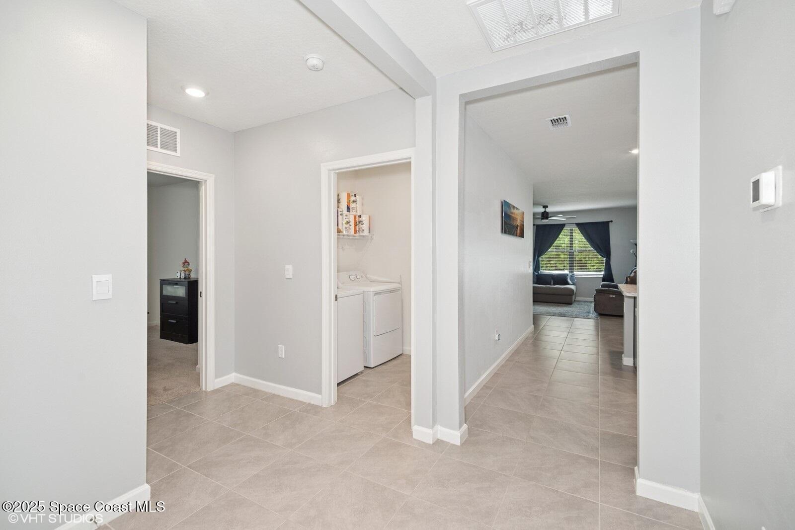 5221 Talbot Boulevard Cocoa, FL 32926 - Photo 4 of 32 a view of a hallway view with three rooms