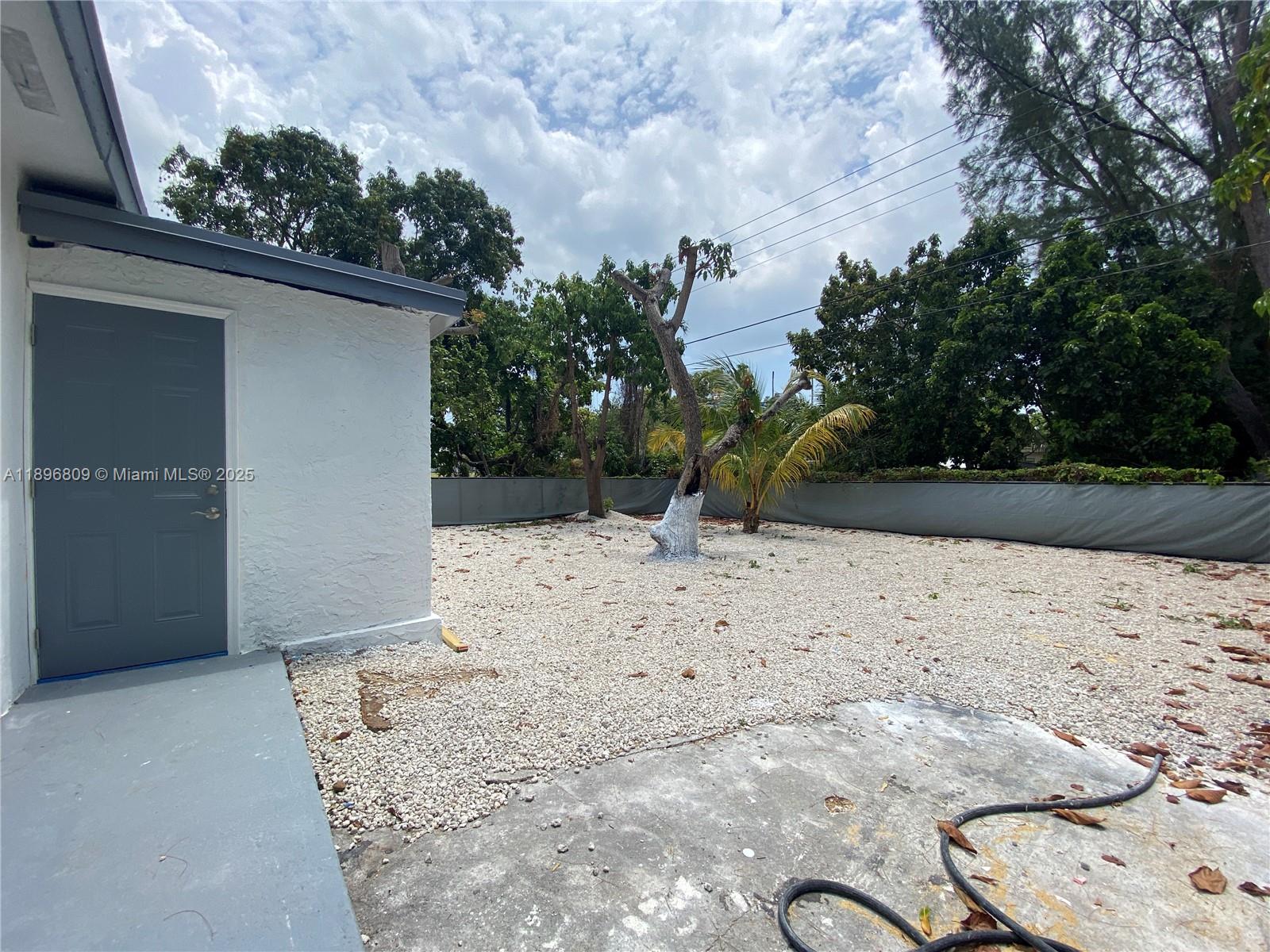 46 Northwest 44th Street, Unit 46 Miami, FL 33127 - Photo 15 of 16 a view of a backyard of a house