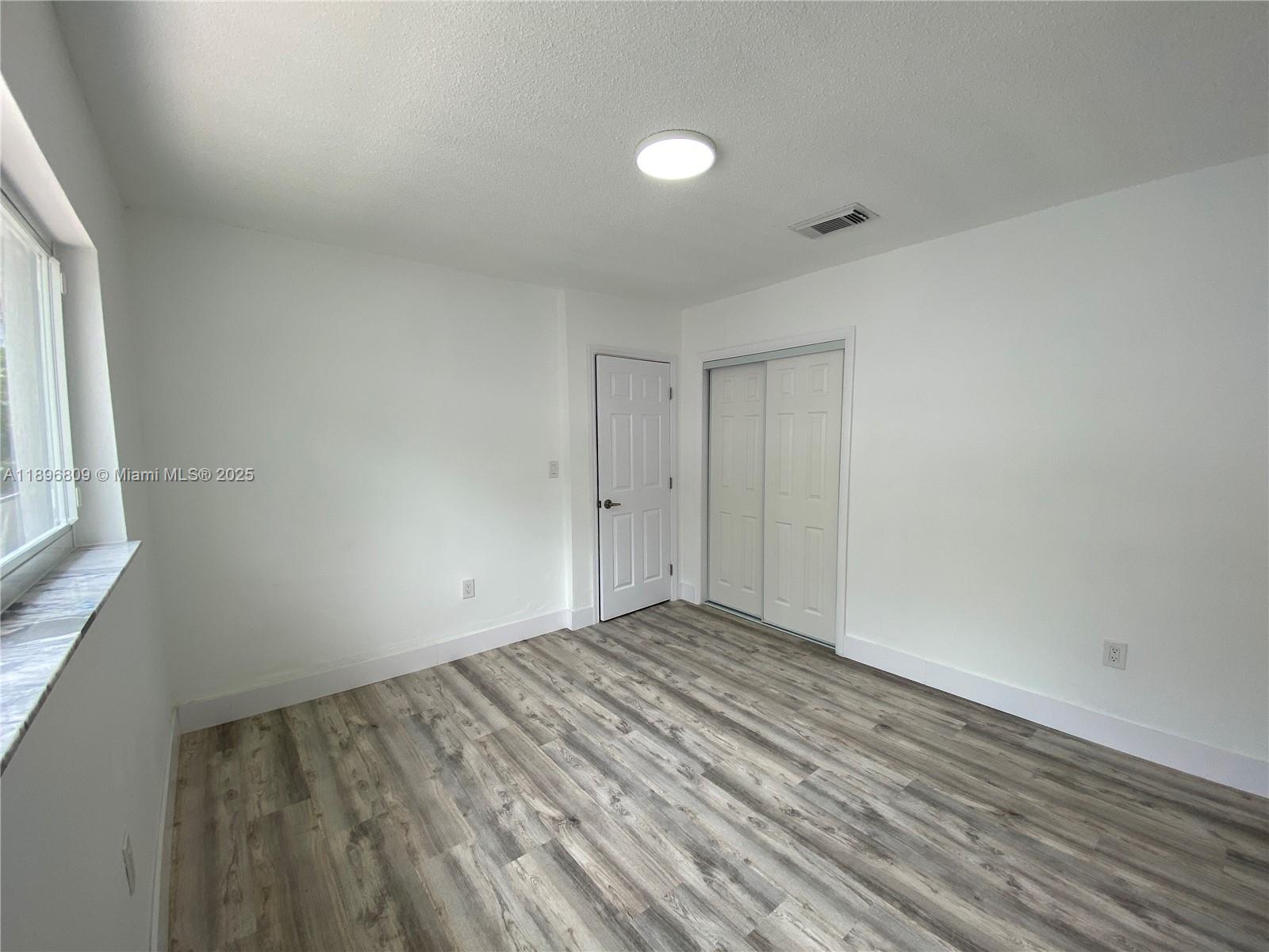 46 Northwest 44th Street, Unit 46 Miami, FL 33127 - Photo 9 of 16 a view of room