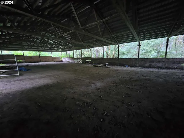 a view of empty room with stairs