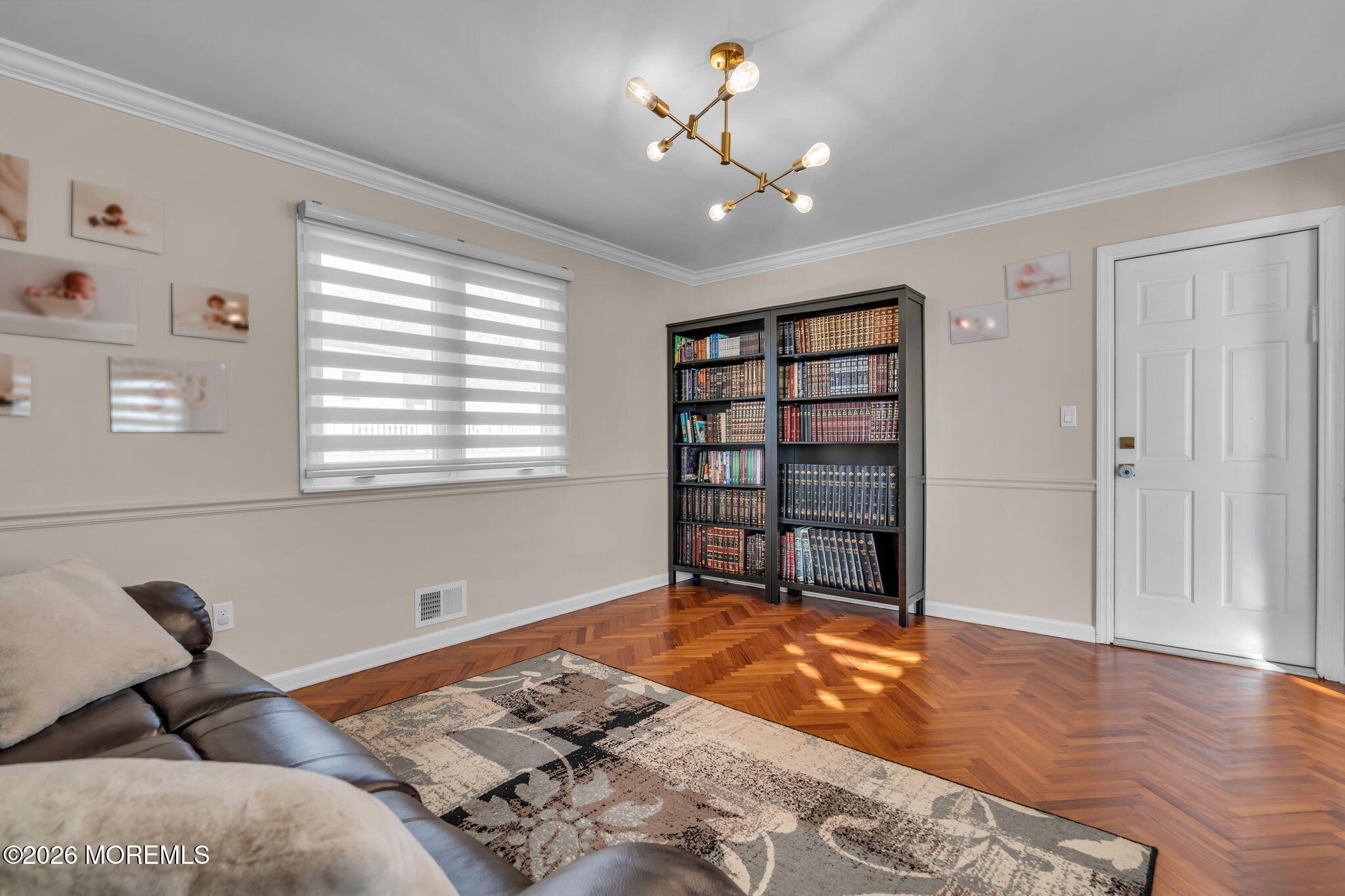 3 Bruce Terrace Jackson, NJ 08527 - Photo 13 of 37 a bedroom with a bed and a chandelier