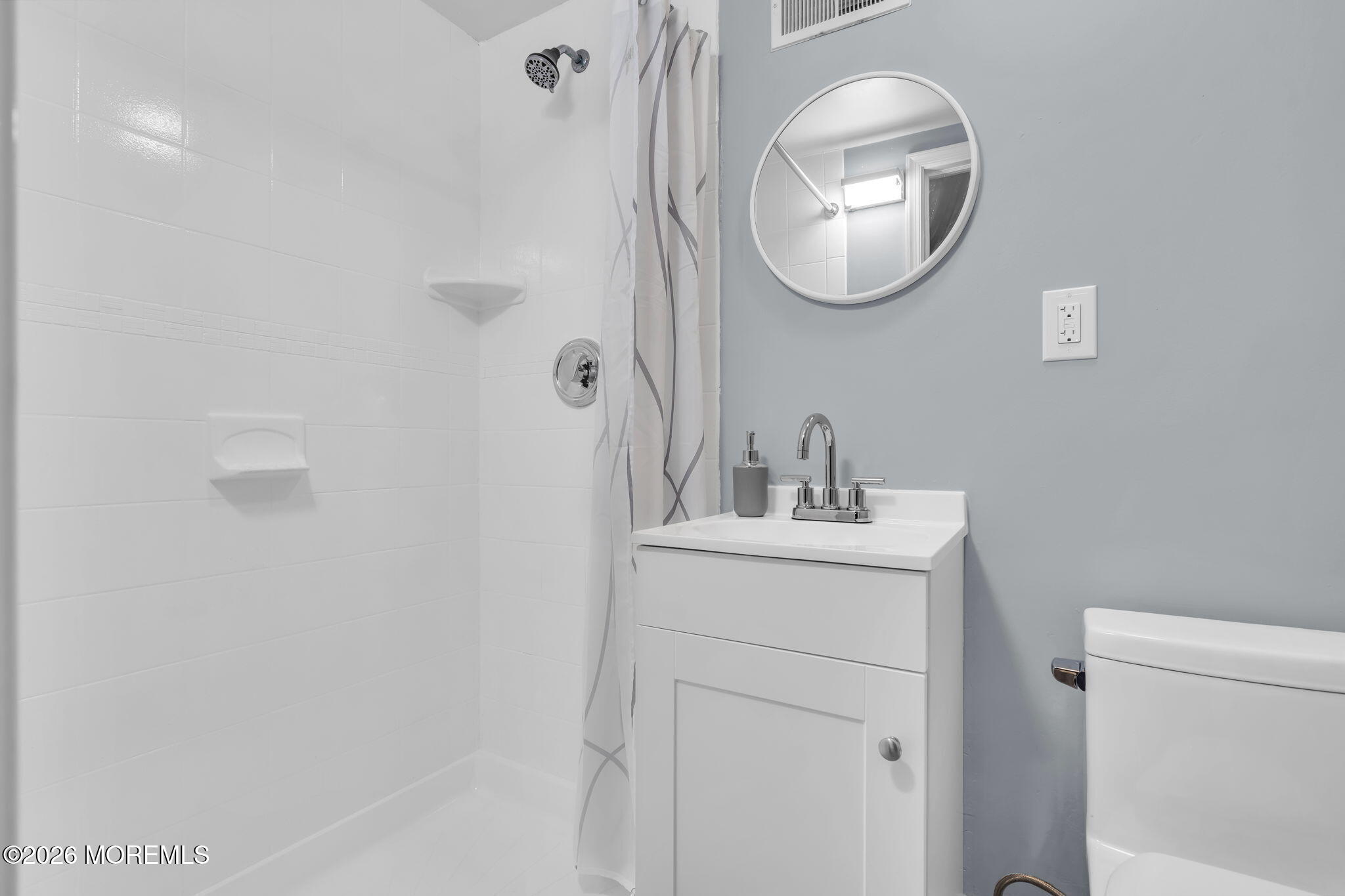 3 Bruce Terrace Jackson, NJ 08527 - Photo 20 of 37 a bathroom with a toilet a sink and mirror