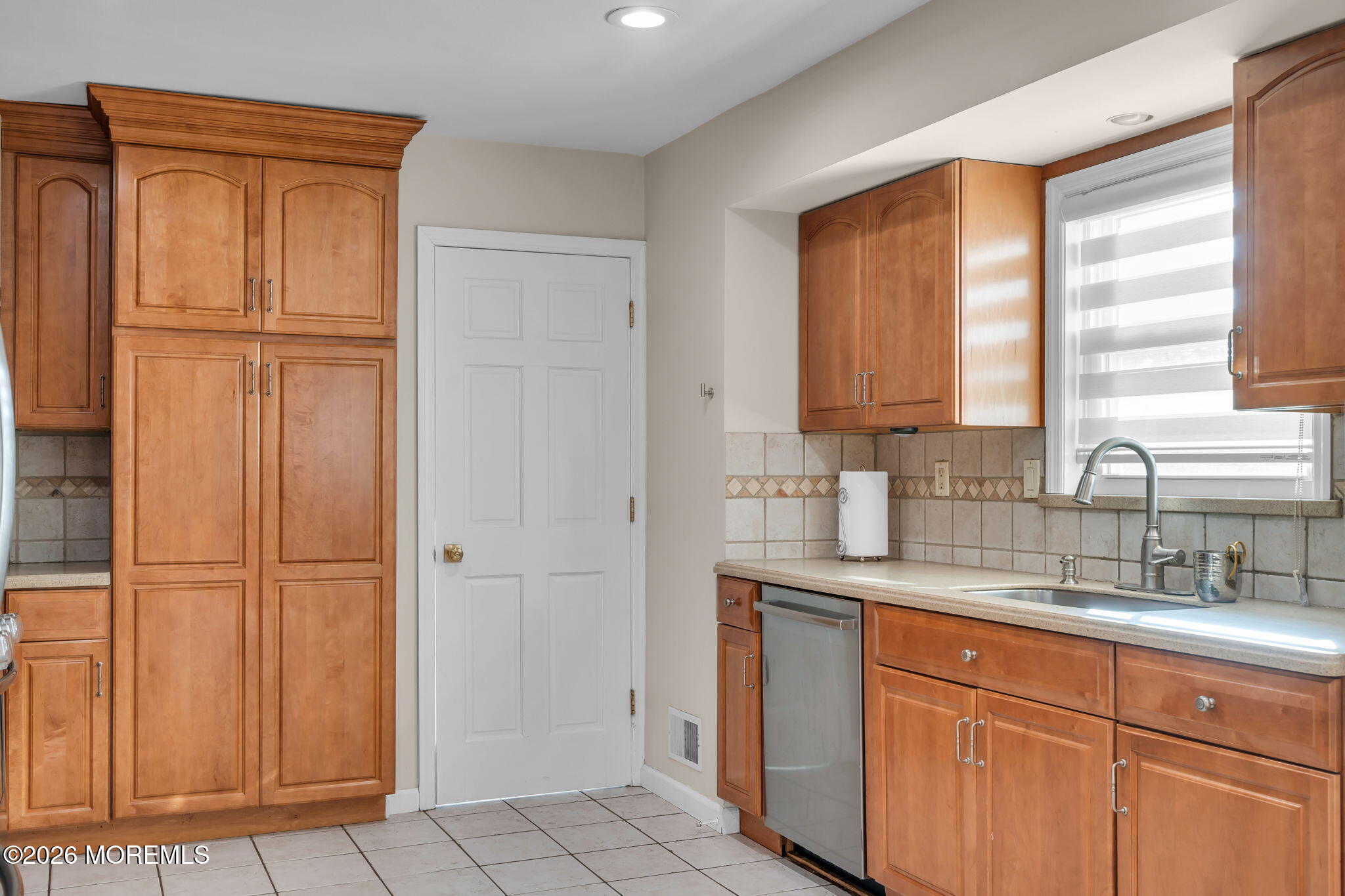 3 Bruce Terrace Jackson, NJ 08527 - Photo 6 of 37 a kitchen with stainless steel appliances granite countertop a sink and a refrigerator