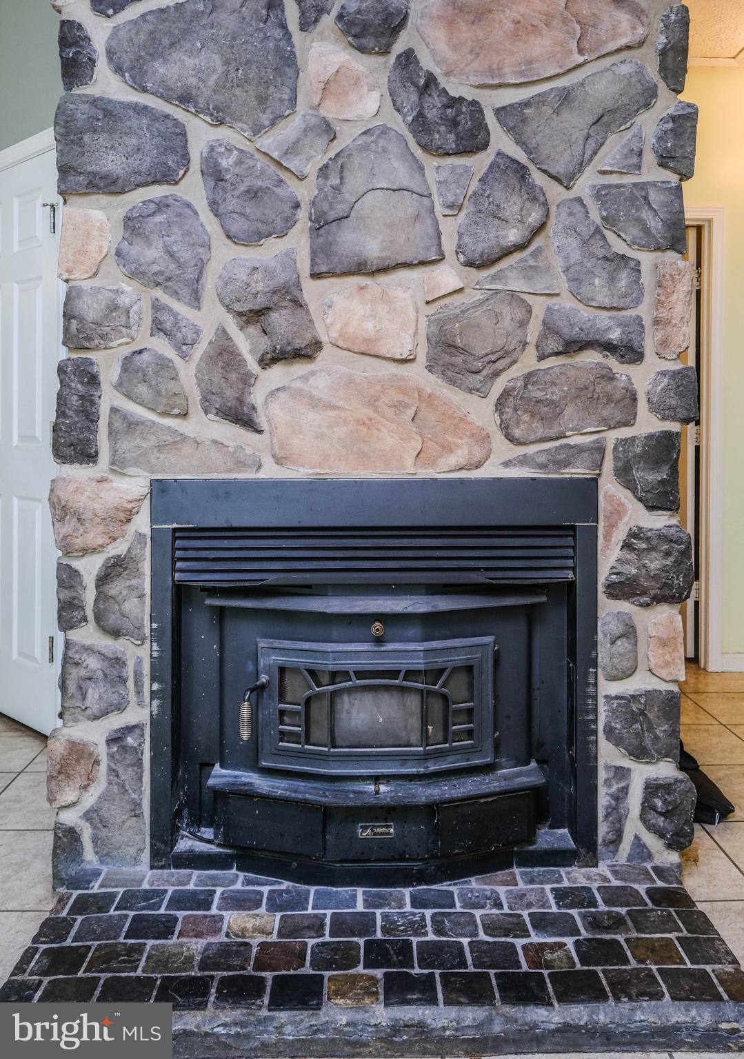 1195 Shangri-La Road Bentonville, VA 22610 - Photo 46 of 64 a fireplace with a clock on it
