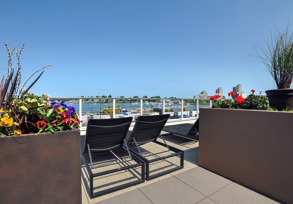 10 Shipyard Drive, Unit 401 Hingham, MA 02043 - Photo 19 of 24 a view of a terrace with sitting area