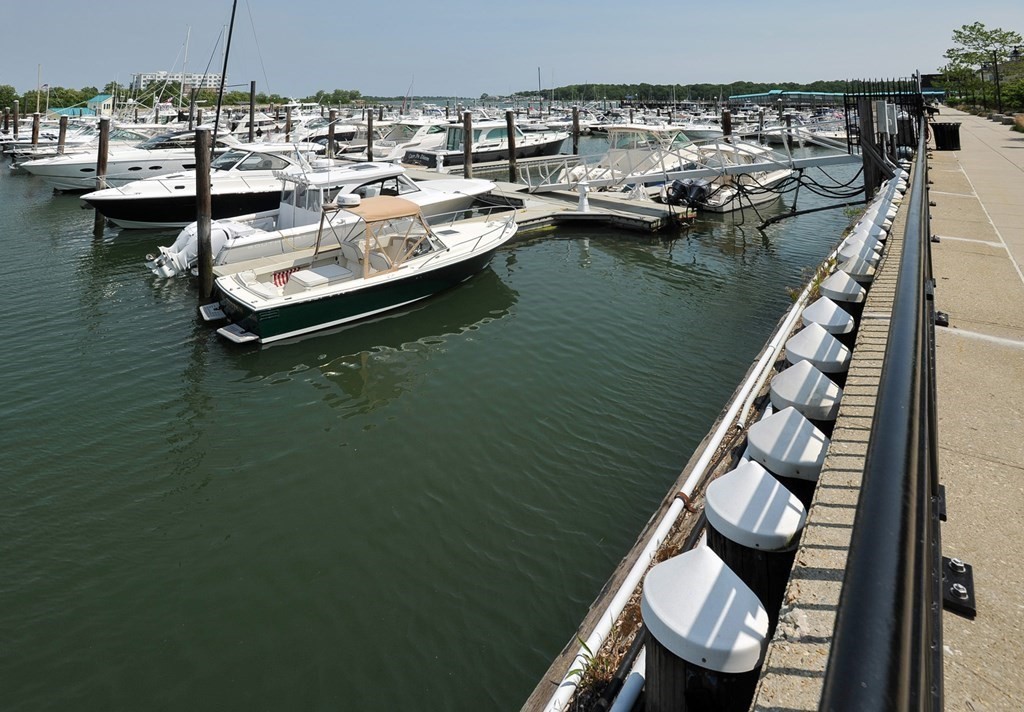 10 Shipyard Drive, Unit 401 Hingham, MA 02043 - Photo 24 of 24 a balcony with dining table and chairs