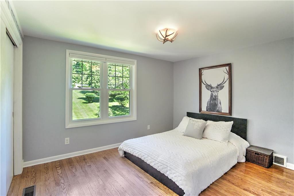 348 Scaife Road Sewickley, PA 15143 - Photo 19 of 25 a bedroom with a bed and a window