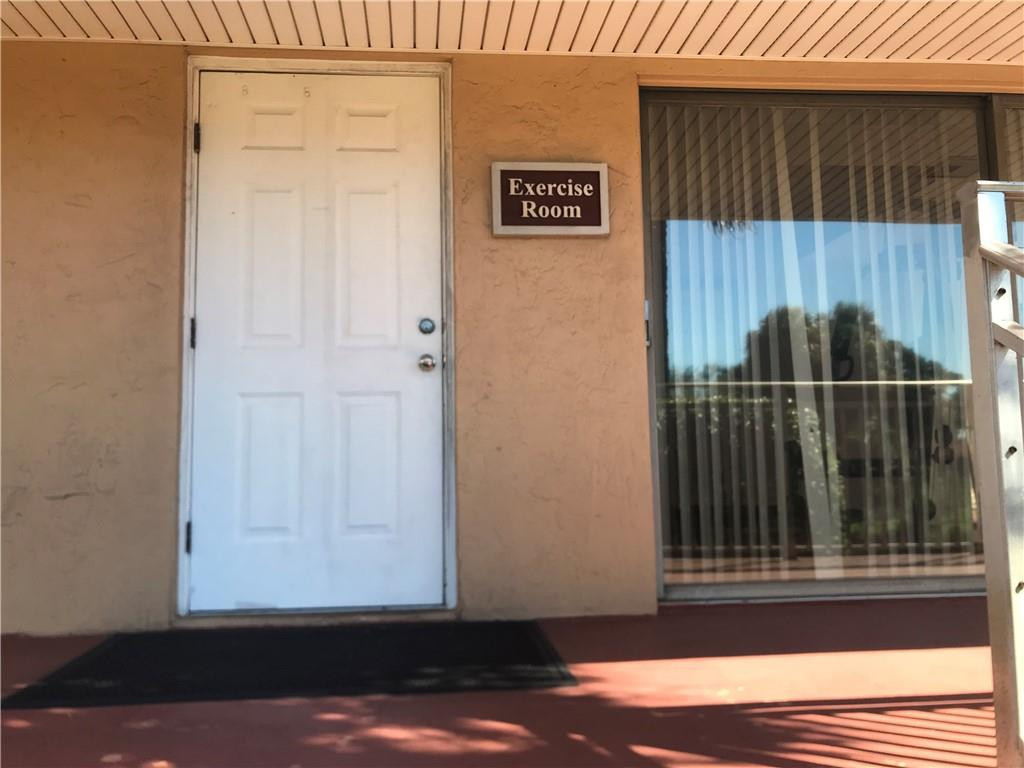 405 South Pine Island Road, Unit 401D Plantation, FL 33324 - Photo 11 of 13 a view of a door and wooden floor