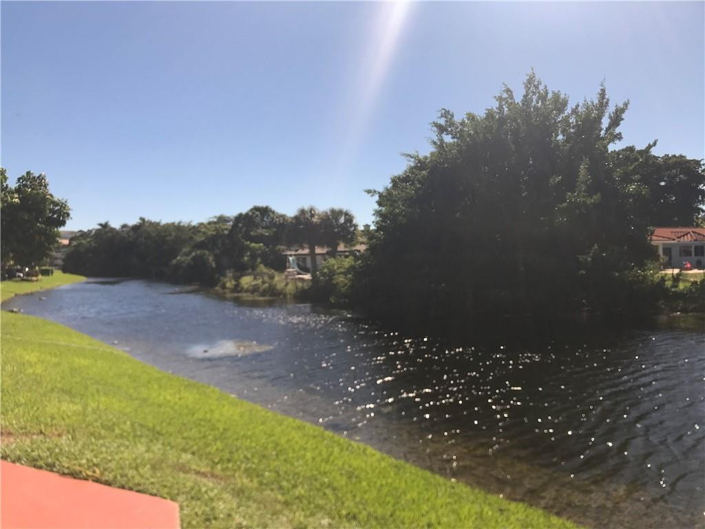 405 South Pine Island Road, Unit 401D Plantation, FL 33324 - Photo 12 of 13 a view of outdoor space and yard