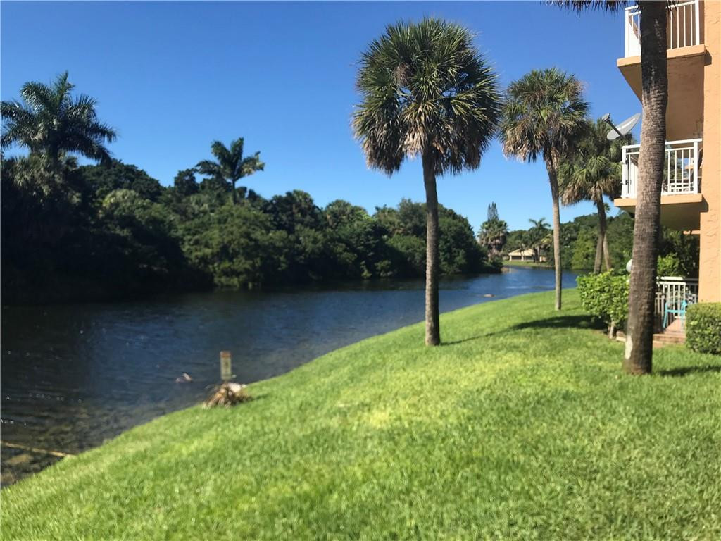 405 South Pine Island Road, Unit 401D Plantation, FL 33324 - Photo 13 of 13 a view of a garden with a slide