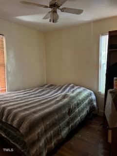 2204 Guess Road Durham, NC 27705 - Photo 12 of 15 a bedroom with a bed and a chandelier