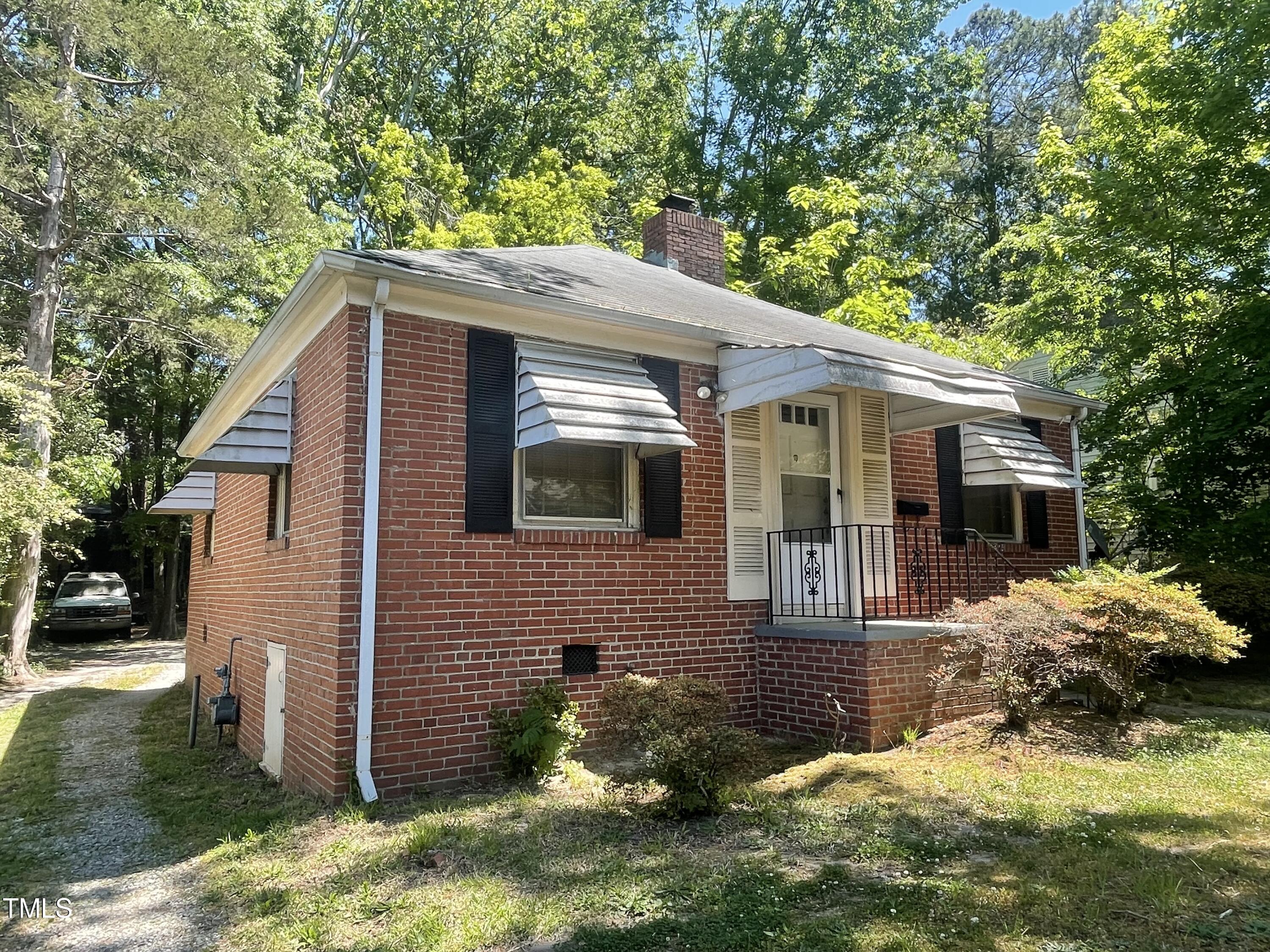 2204 Guess Road Durham, NC 27705 - Photo 2 of 15 a view of a house with a yard