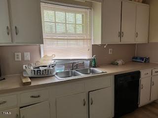2204 Guess Road Durham, NC 27705 - Photo 4 of 15 a kitchen with a sink and cabinets