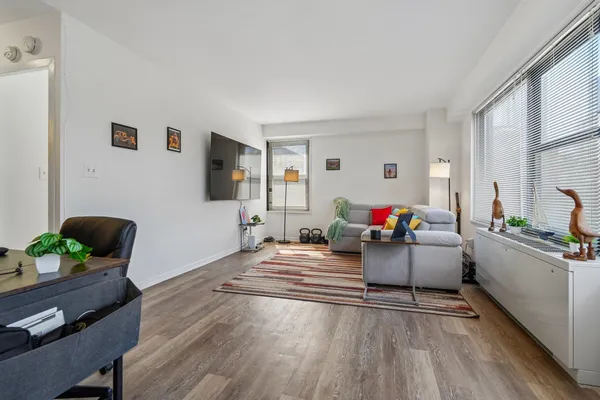 a living room with furniture and a couch