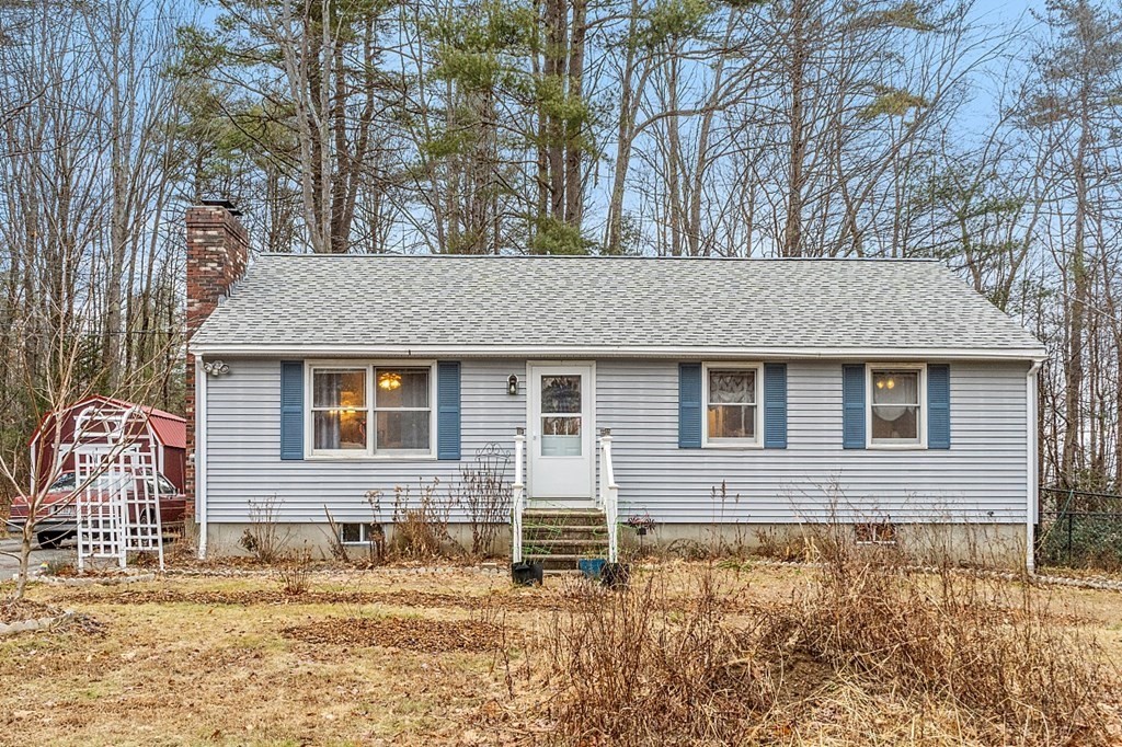 628 Teel Road Winchendon, MA 01475 - Photo 1 of 38 a front view of a house with a yard