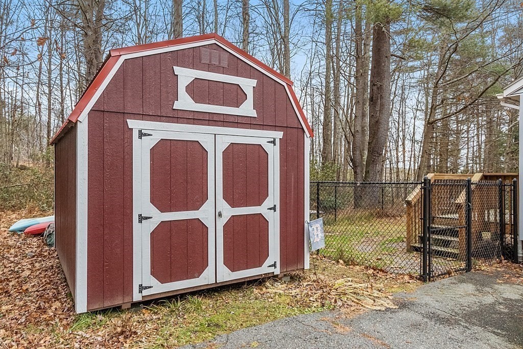 628 Teel Road Winchendon, MA 01475 - Photo 36 of 38 a house with trees in front of it