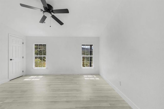 a view of a room with an empty space