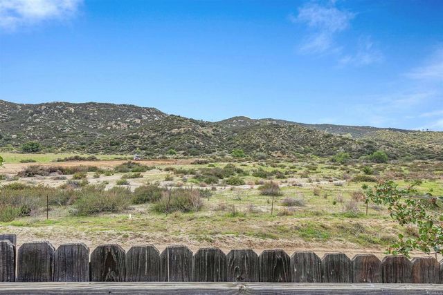 a view of a terrace with a lake view