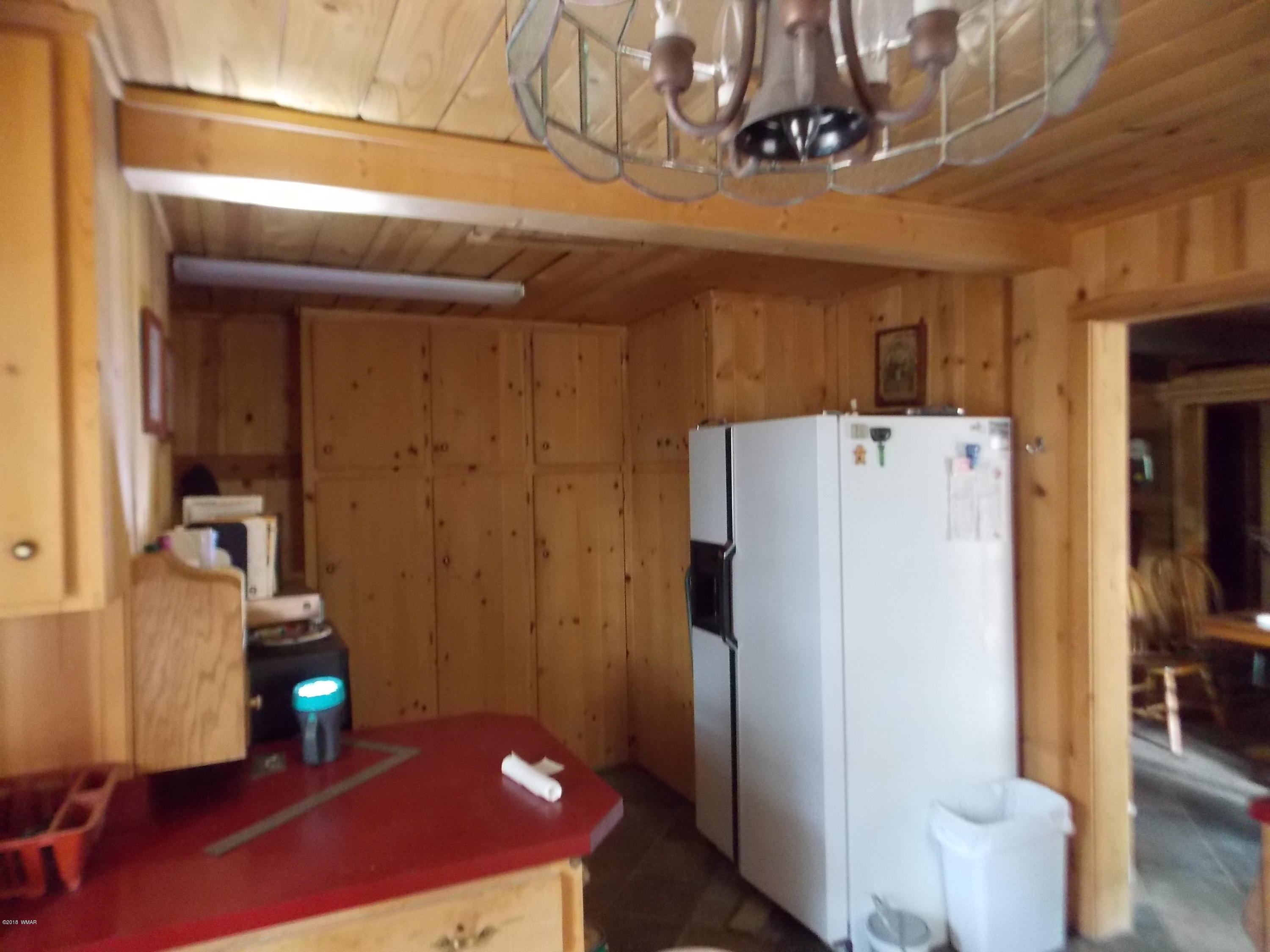 1830 Artist Draw Road Heber, AZ 85928 - Photo 6 of 29 a refrigerator freezer sitting inside of a room