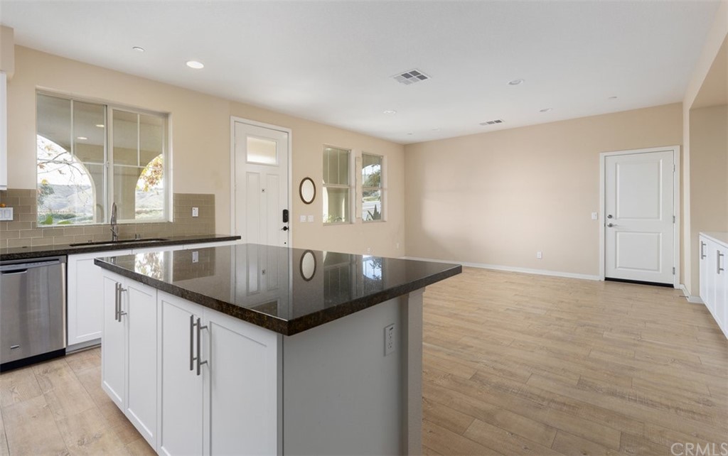 2 Adelfa Street Rancho Mission Viejo, CA 92694 - Photo 12 of 56 a kitchen with granite countertop a sink and a granite top