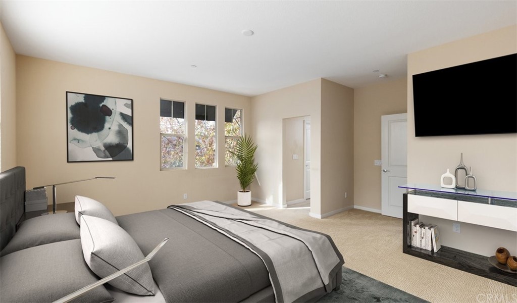 2 Adelfa Street Rancho Mission Viejo, CA 92694 - Photo 14 of 56 a bedroom with a bed and a flat screen tv