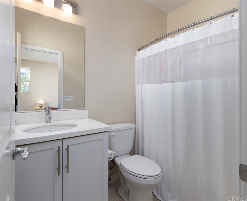 2 Adelfa Street Rancho Mission Viejo, CA 92694 - Photo 19 of 56 a bathroom with a sink a toilet and shower