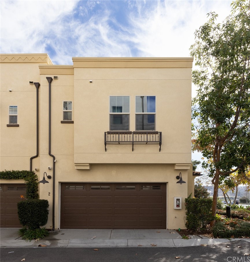 2 Adelfa Street Rancho Mission Viejo, CA 92694 - Photo 21 of 56 a front view of a building with pathway