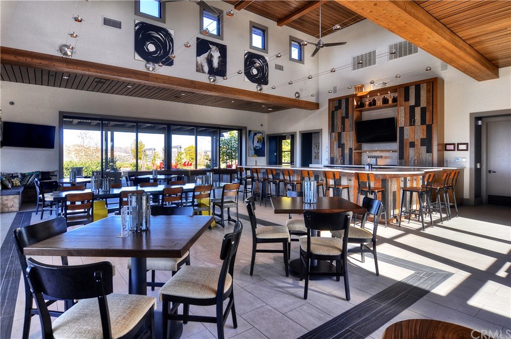 2 Adelfa Street Rancho Mission Viejo, CA 92694 - Photo 37 of 56 a dining room with furniture and wooden floor