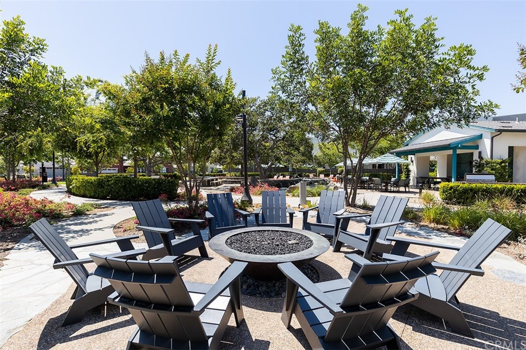 2 Adelfa Street Rancho Mission Viejo, CA 92694 - Photo 50 of 56 a view of a patio with table and chairs and potted plants