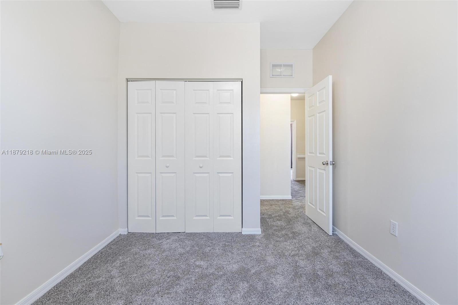 9135 Southwest 203rd Terrace Cutler Bay, FL 33189 - Photo 20 of 27 a view of an empty room