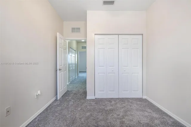 a view of an empty room with window