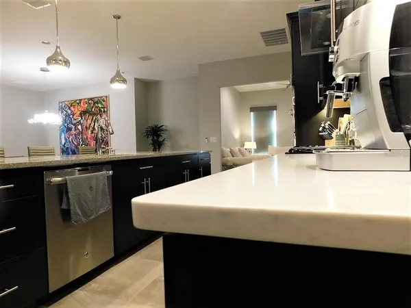 a close view of refrigerator and sink