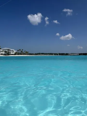 a view of an ocean and a yard