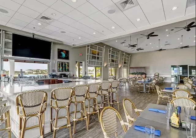 a living room with lots of furniture and a flat screen tv
