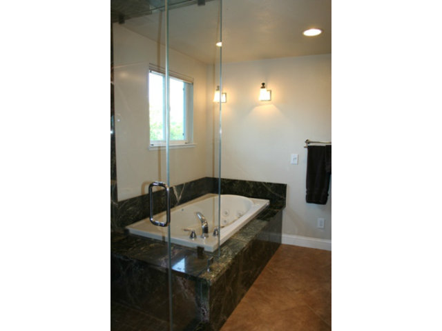 14754 Bronson Avenue San Jose, CA 95124 - Photo 12 of 18 a bathroom with a sink and a mirror