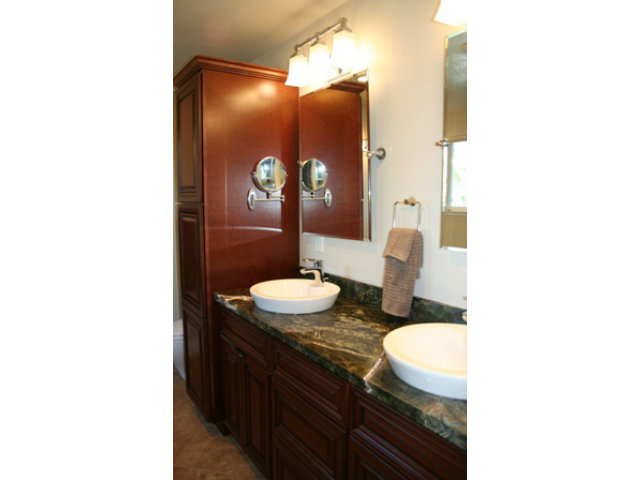 14754 Bronson Avenue San Jose, CA 95124 - Photo 13 of 18 a bathroom with a sink and a mirror