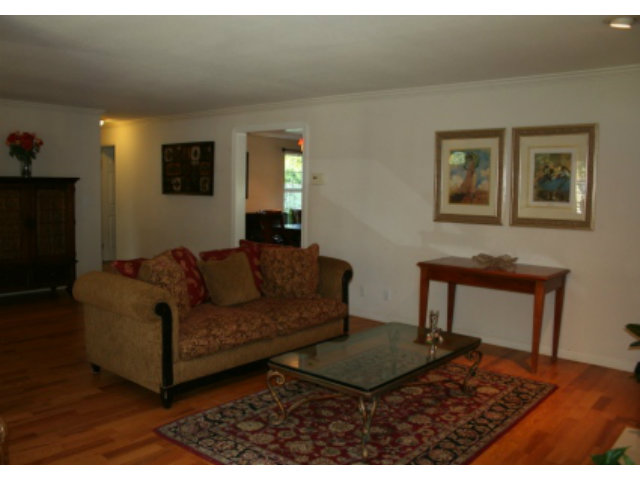 14754 Bronson Avenue San Jose, CA 95124 - Photo 2 of 18 a living room with furniture and a wooden floor