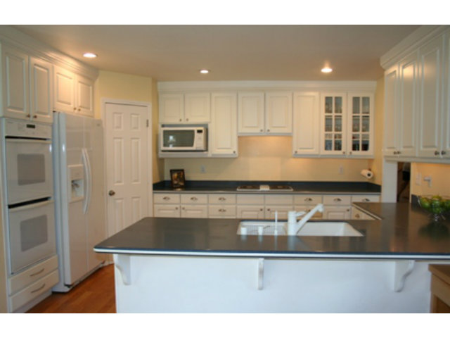 14754 Bronson Avenue San Jose, CA 95124 - Photo 4 of 18 a kitchen with kitchen island a counter top space appliances and cabinets