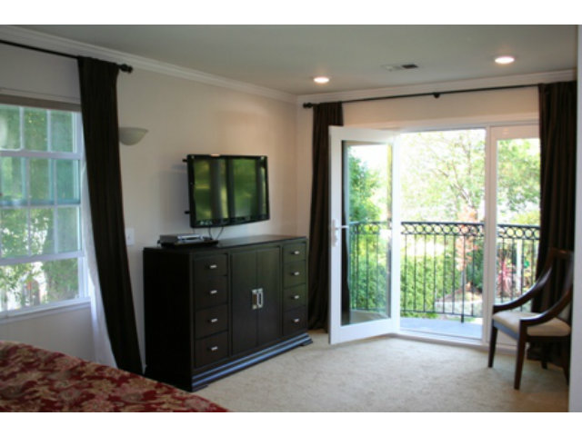 14754 Bronson Avenue San Jose, CA 95124 - Photo 10 of 18 a living room with furniture and a flat screen tv