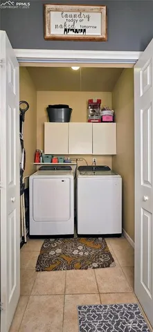 a white cabinets and a stove