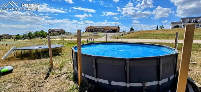 a view of a chairs and table on the terrace