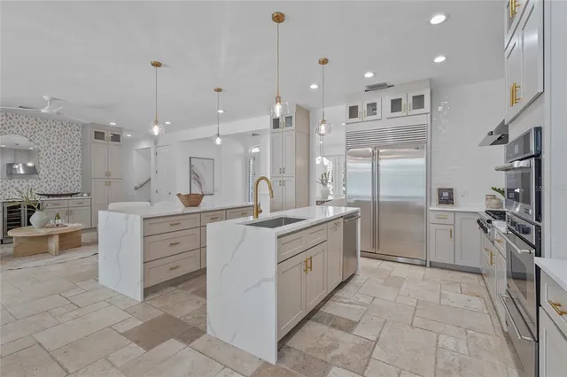a bedroom with a bed and cabinets