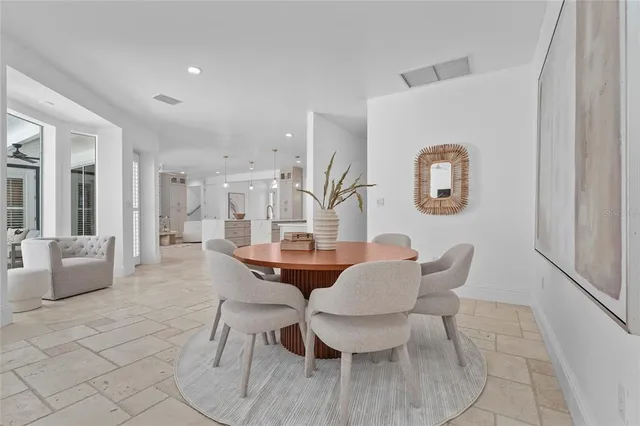 a bath tub sitting in a bathroom next to a window